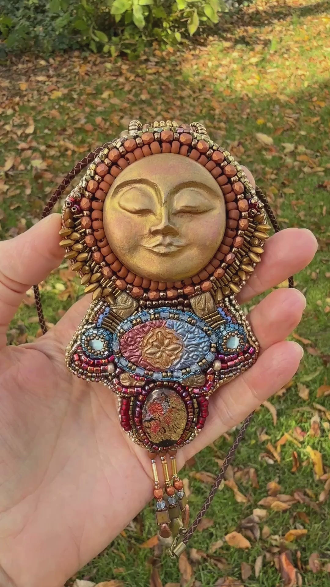 Statement beaded sun talisman necklace