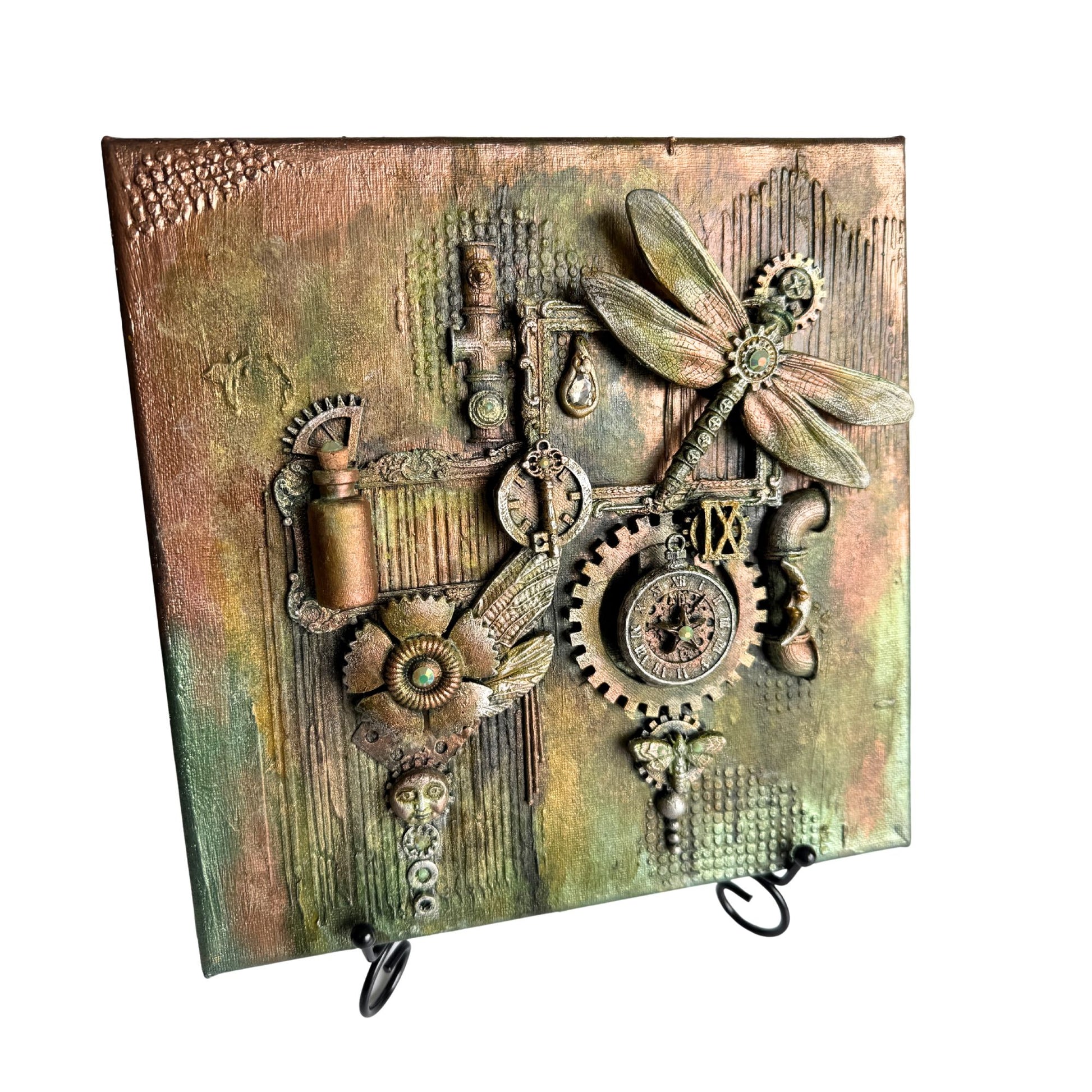 Decorative wall hook with steampunk design featuring gears and flowers on a wooden background.