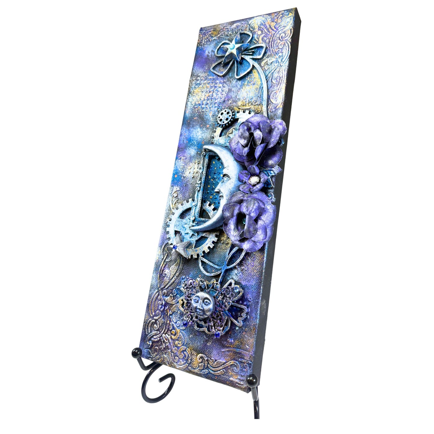 Decorative wall art with floral and clock design on a white background