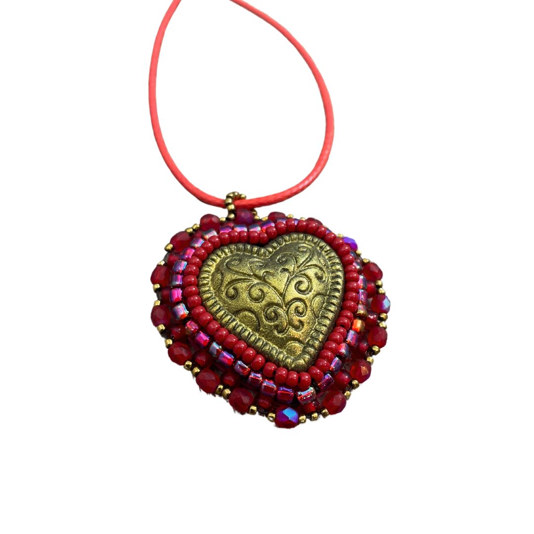 Gold puffed filigree heart red beaded pendant