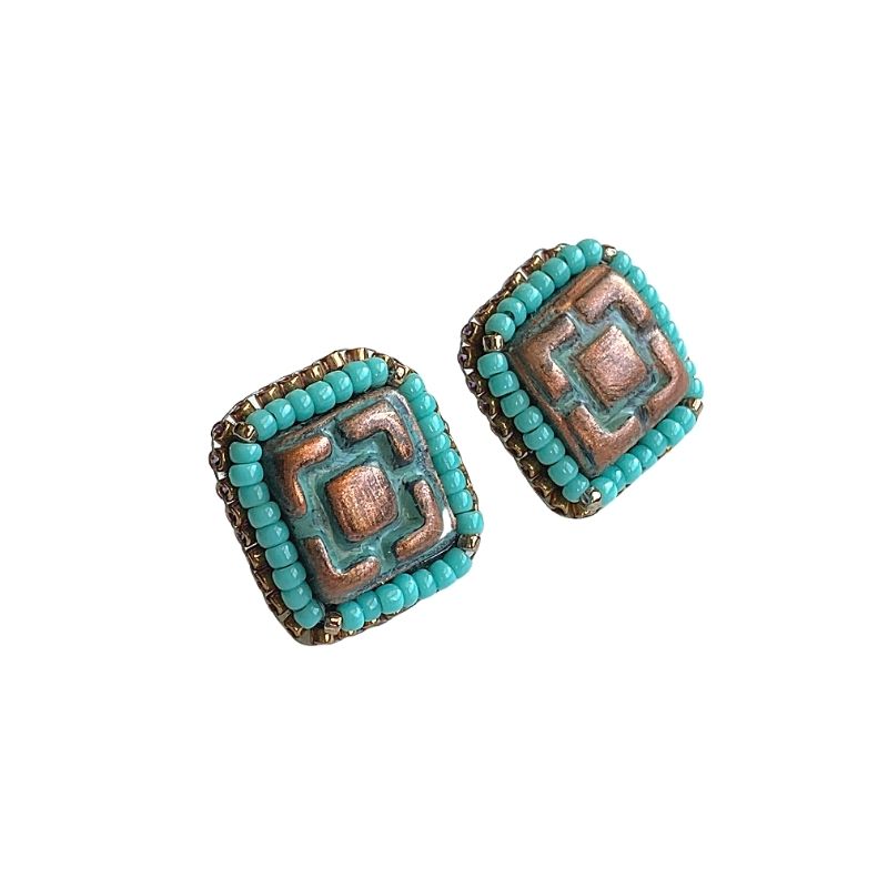 Square Aztec stud earrings with antiqued finish with turquoise and gold seed bead edging.