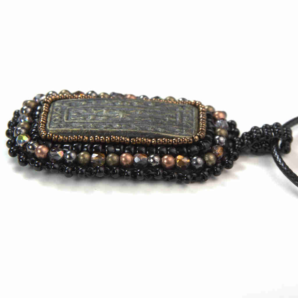 black and bronze rectangular pendant with awesome awesome polymer clay black beaded fringe