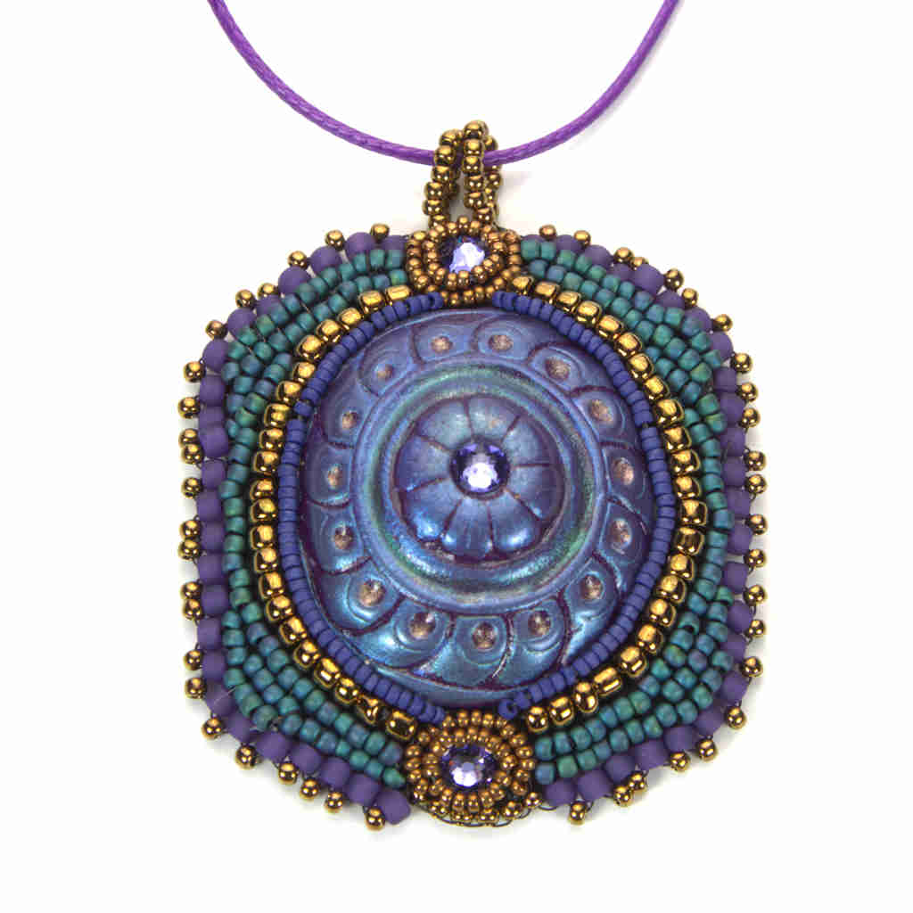 Large mardi gras purple, gold, and green beaded pendant with crystals and beaded bezel and bail