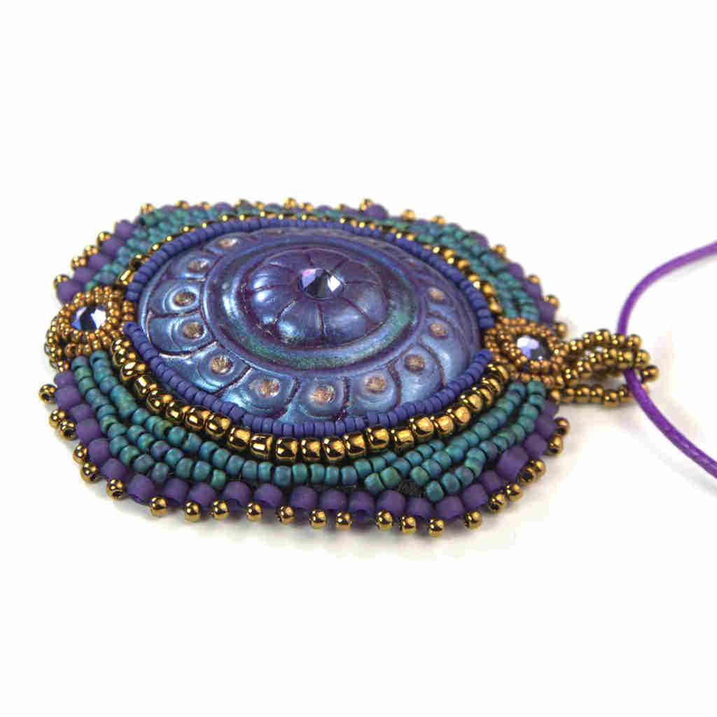 Large mardi gras purple, gold, and green beaded pendant with crystals and beaded bezel and bail