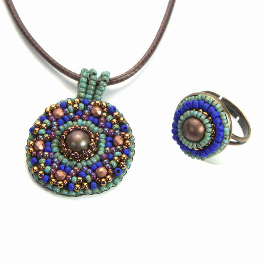 Mandala pendant and ring set in turqoise, blue, and gold