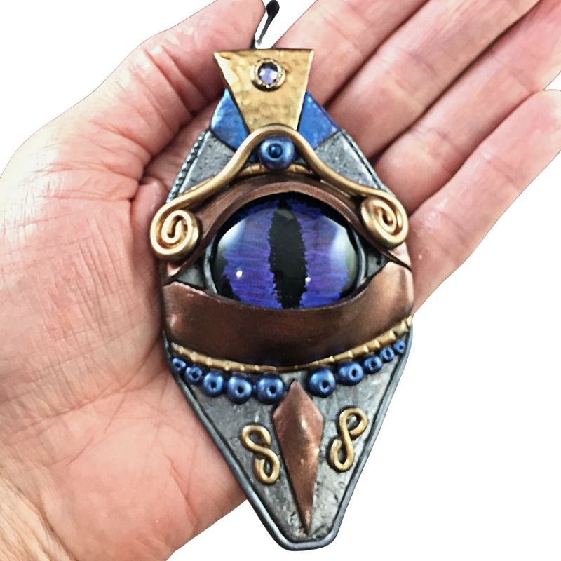 Handmade polymer clay evil eye talisman necklace with silver and gold details