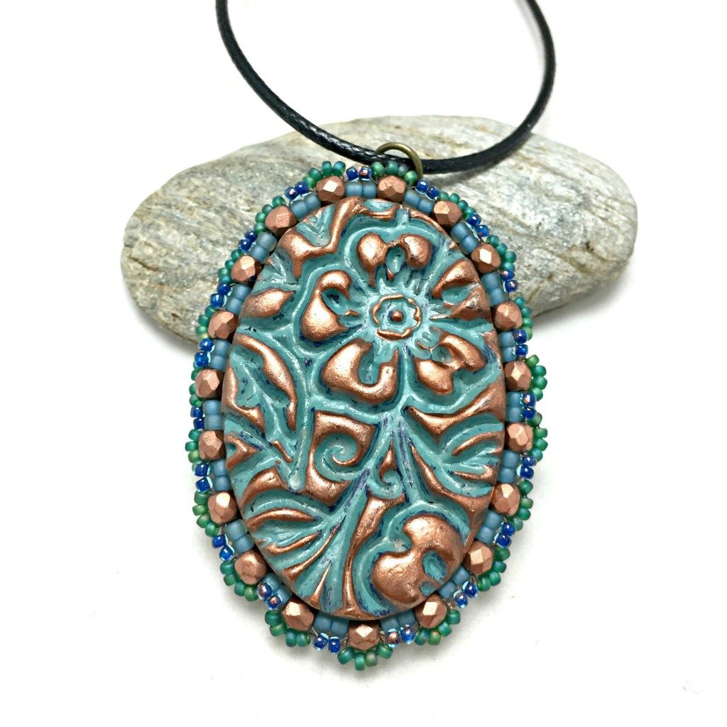 scalloped edge floral pendant
