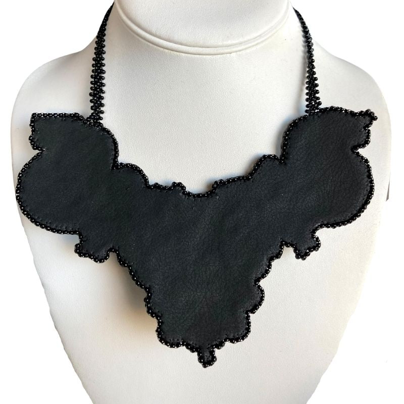Reverse of gothic bib necklace