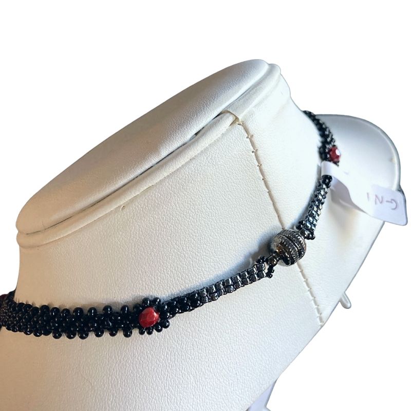 Side view of black beaded chain and clasp of gothic beaded choker