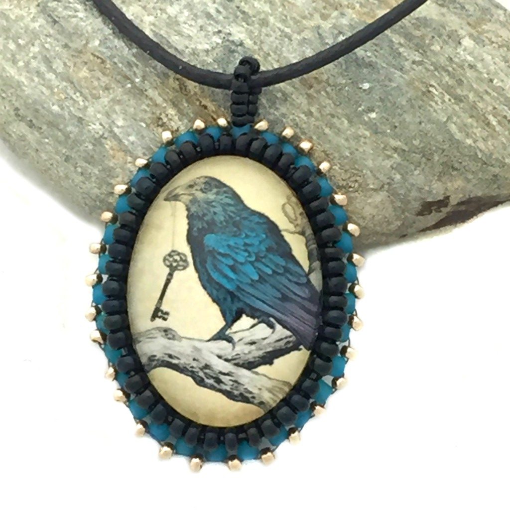 blue raven pendant