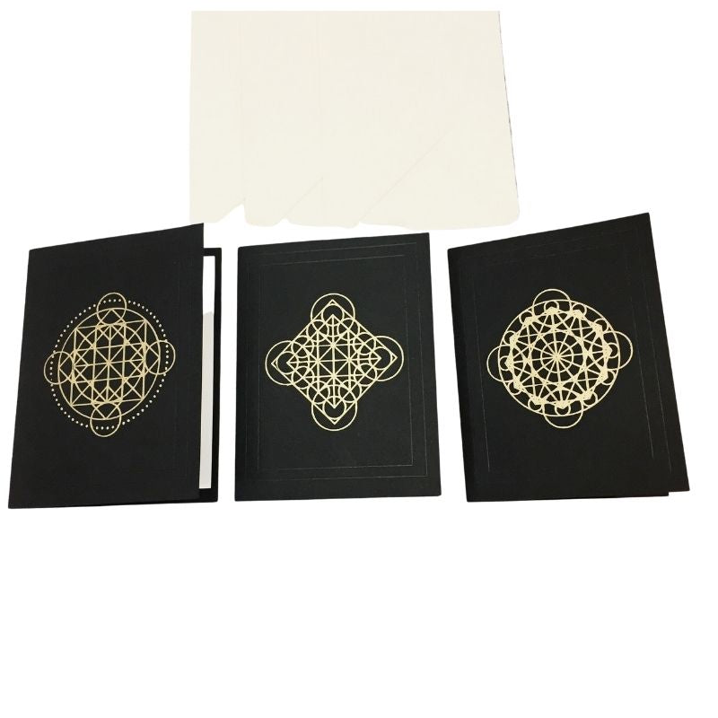 black alchemy boxed notecards with gold ink geometric shapes