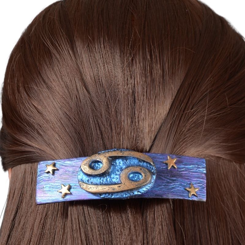 cancer star sign hair clip modeled in hair.