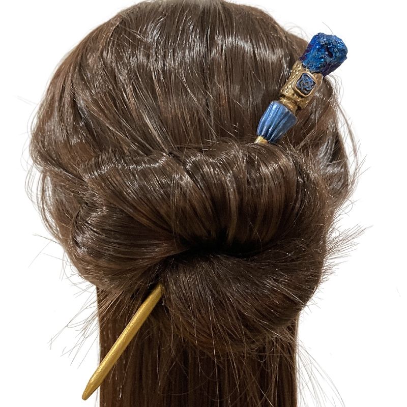 Blue Druzy agate crystal hair stick with Blue and gold Celtic Knot design in mannequin's hair
