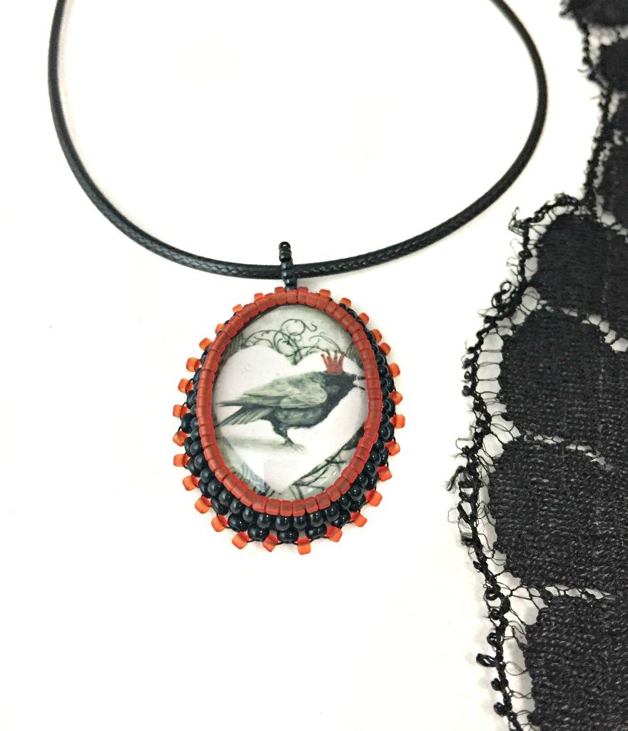Red crown raven necklace