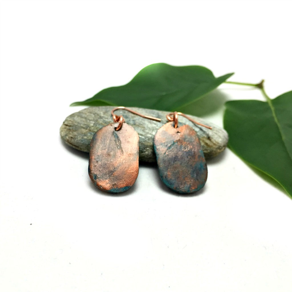 Back of floral patina earrings