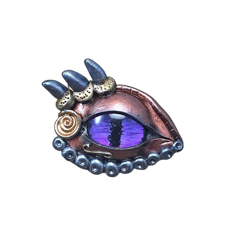 dragon's eye brooch made with polymer clay and glass dome eye