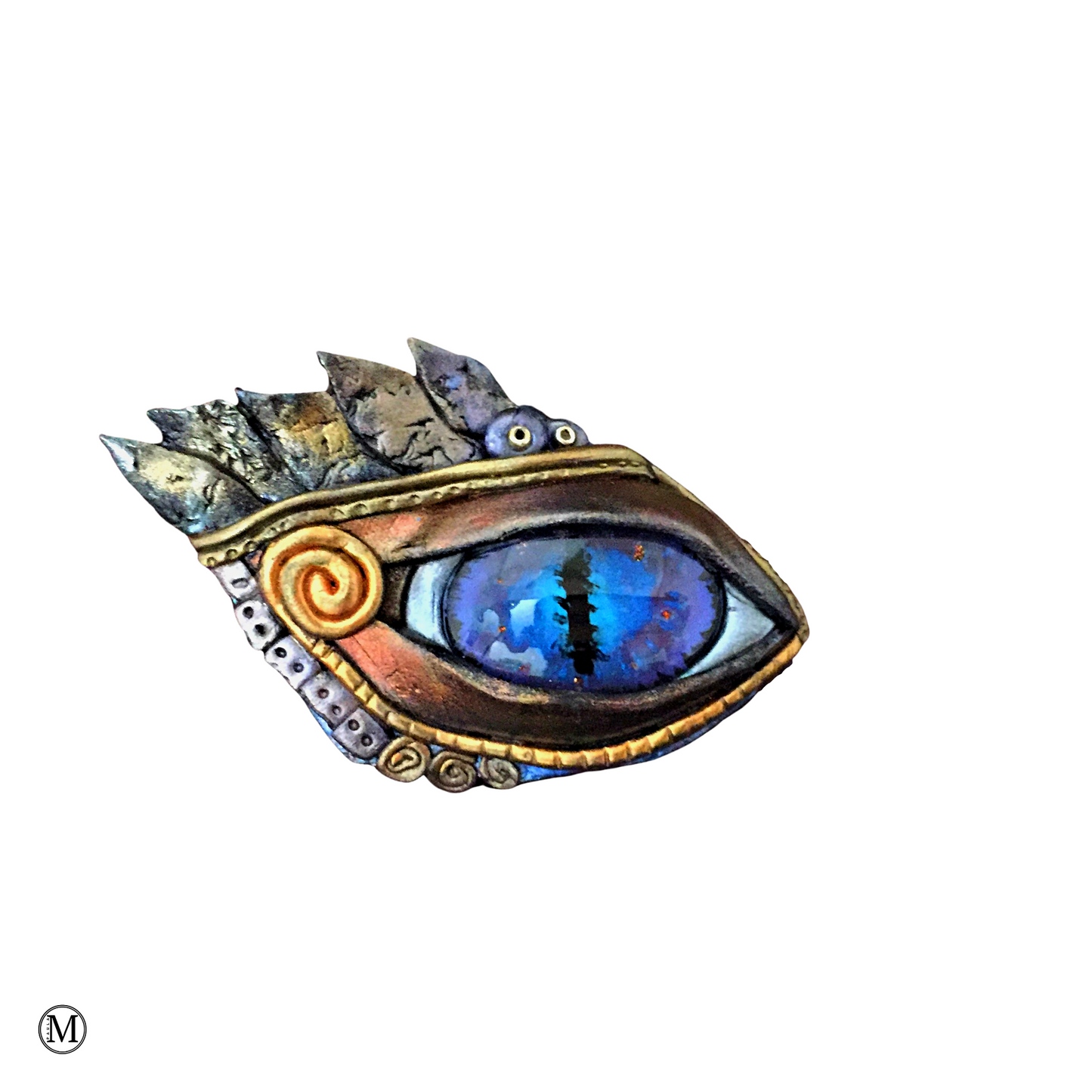 egyptian blue eye brooch with gold and bronze feather details and gold swirl at corner of the eye.