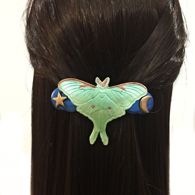 green moth in hair