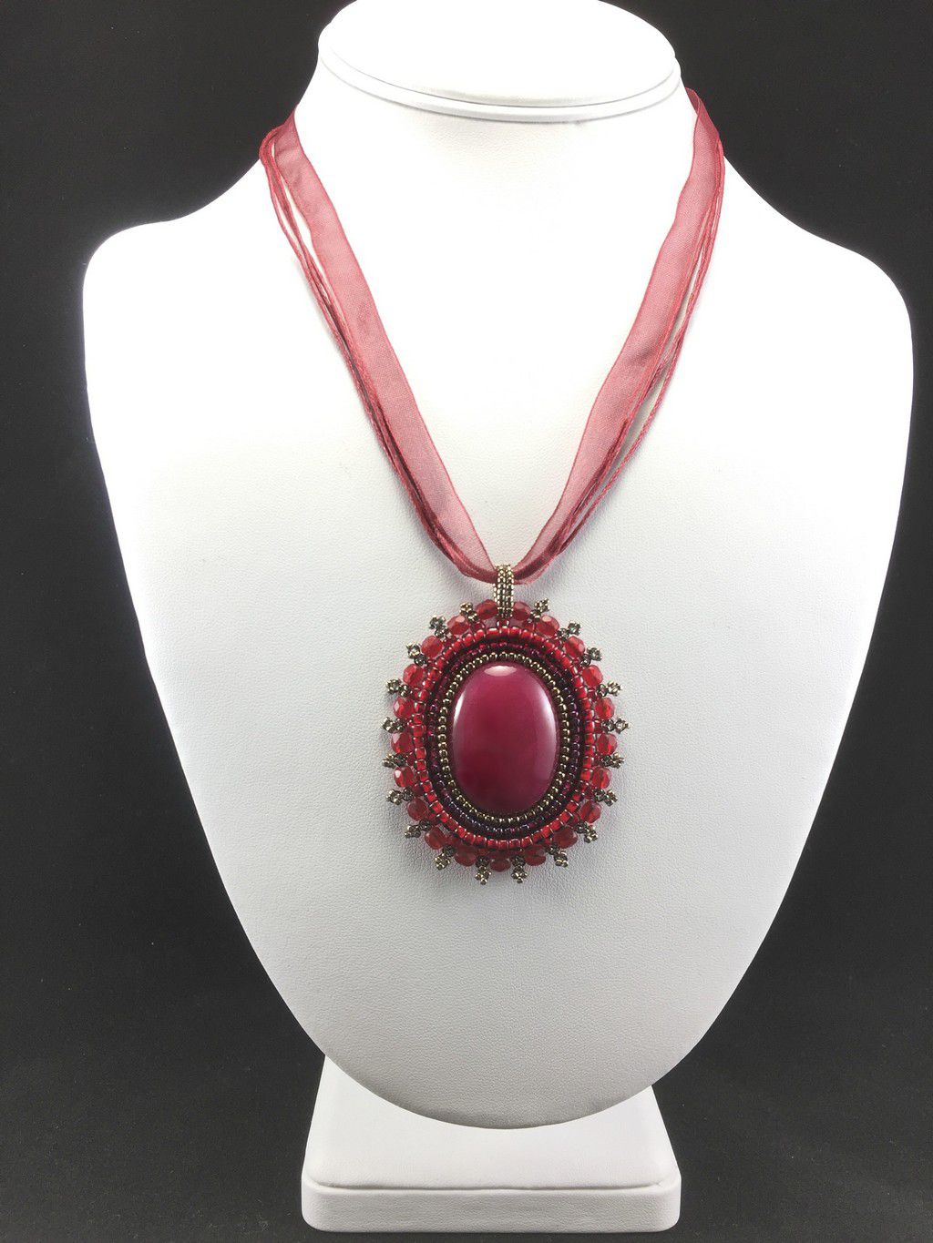 red victorian necklace mannequin