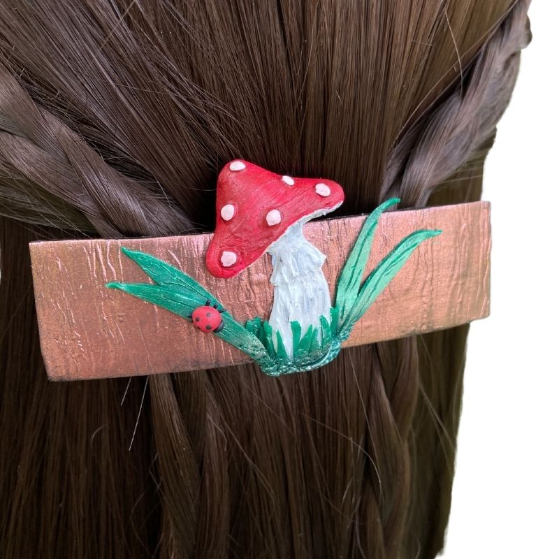 laybug hair clip with red mushroom