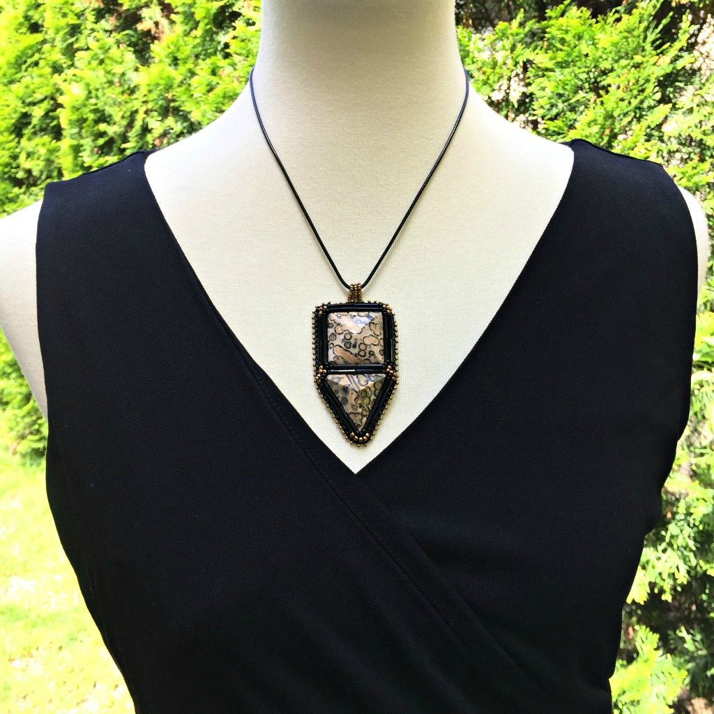 leopard skin jasper pendant on mannequin