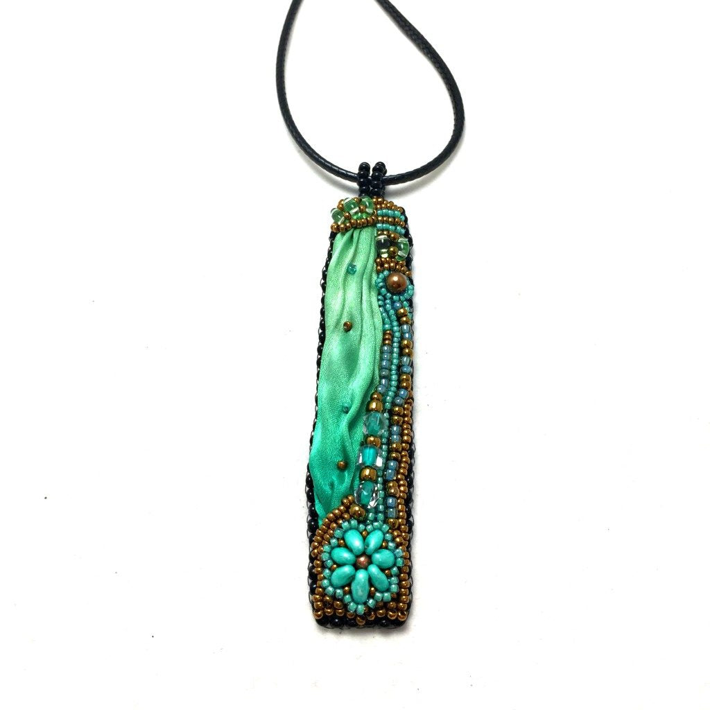 long green silk pendant