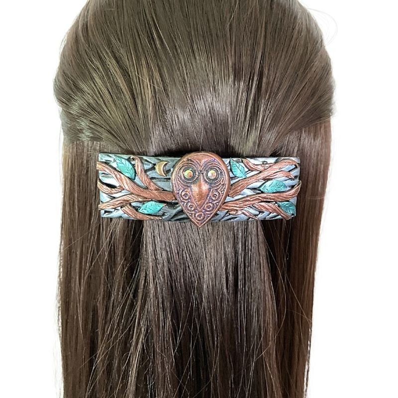 pagan owl with crystal eyes hair clip on model