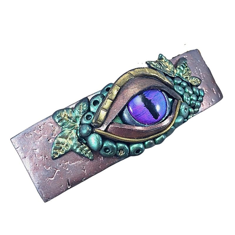 right view of an evil eye protection talisman hair clip sculpted with polymer clay