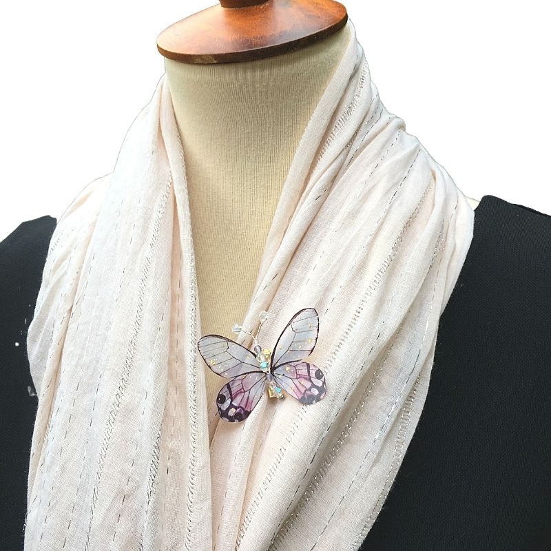 butterfly brooch on shawl