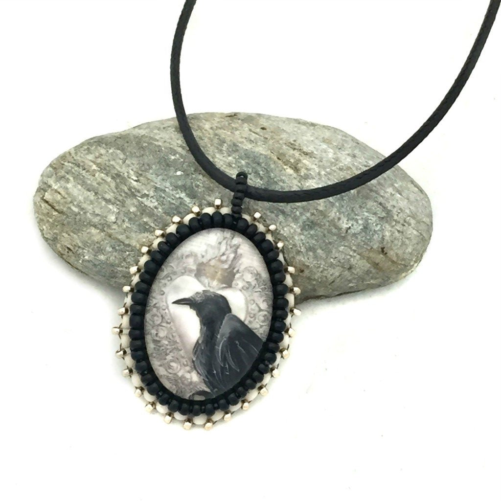 distance shot of raven art necklace
