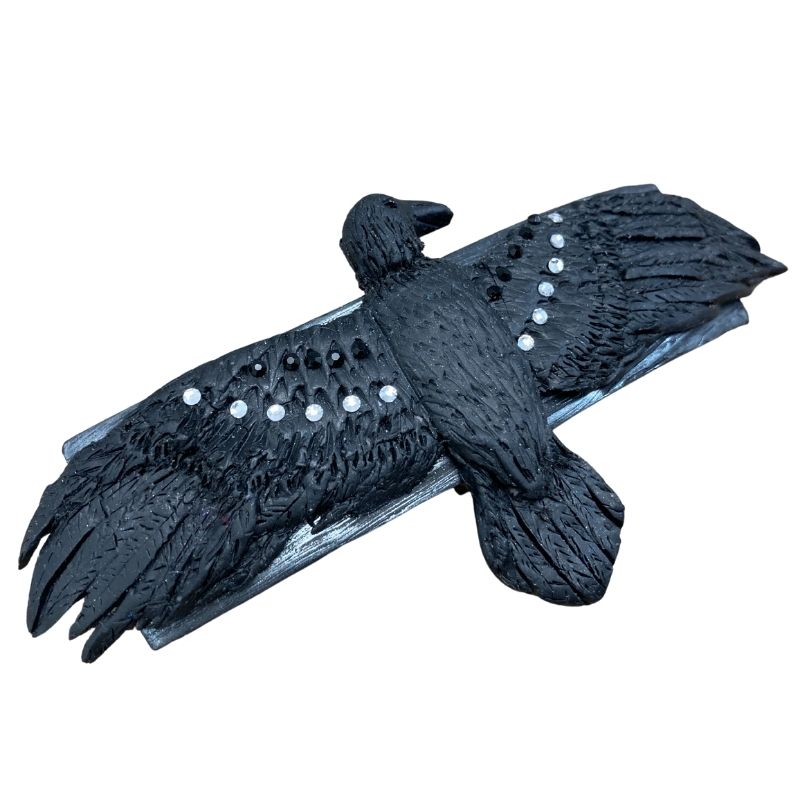 black raven hair clip with crystals on wings