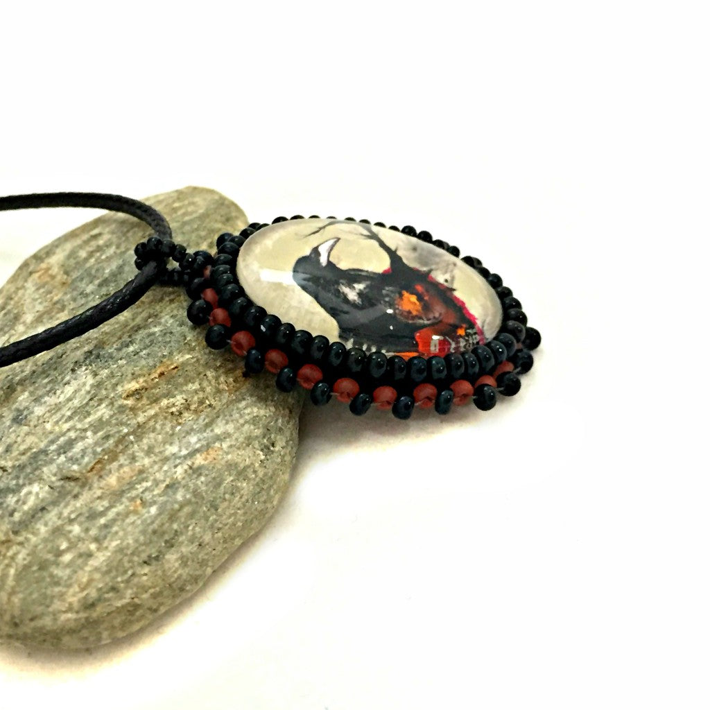 right side of black crown necklace