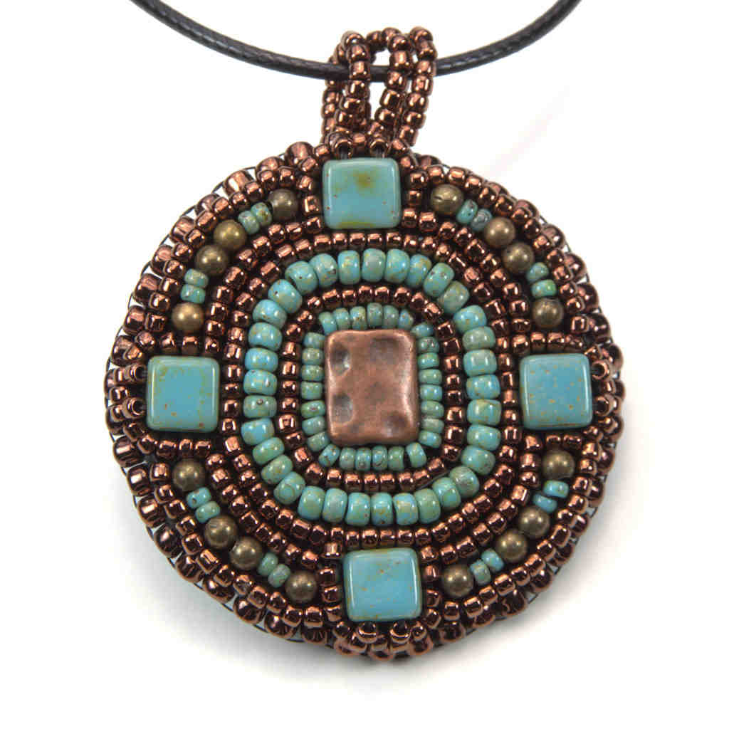 round aztek beaded art pendant statement bronze