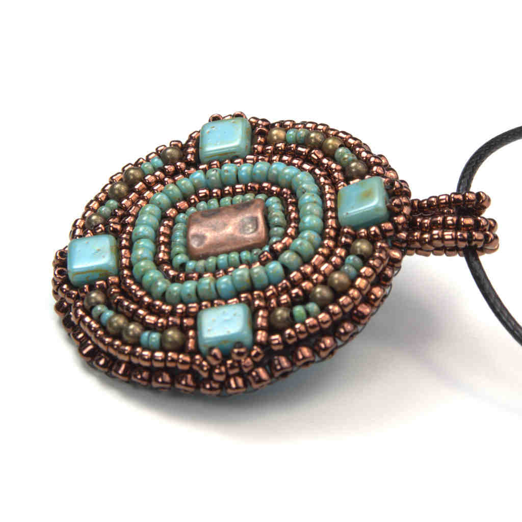 round aztek beaded art pendant statement bronze