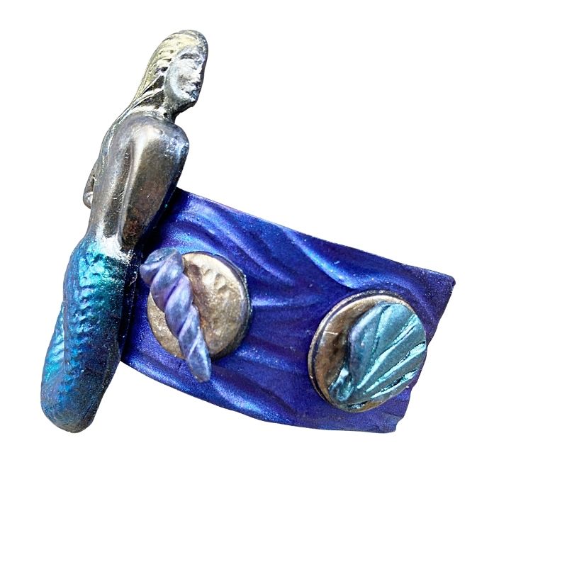sea siren hair clip made with polymer clay with seashells along the sides
