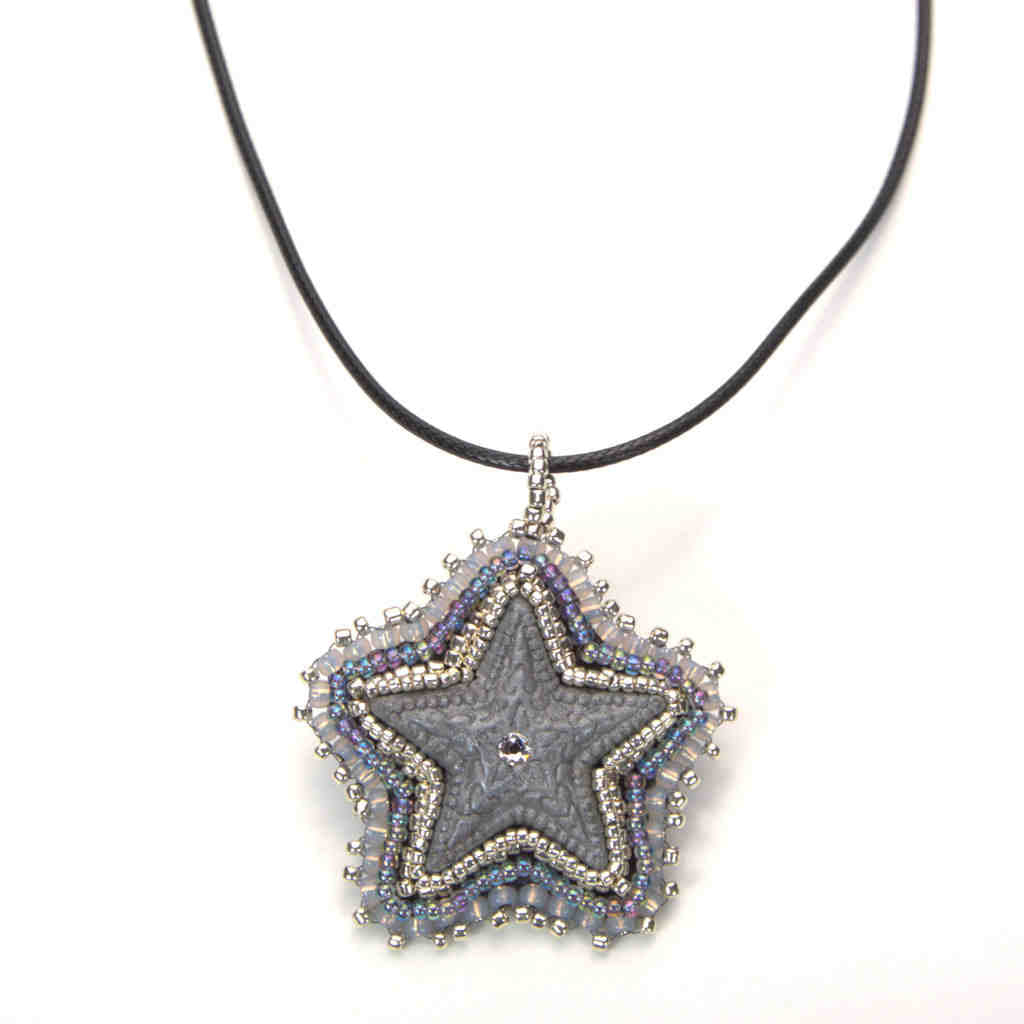 silver star pendant crystal center grey iridescent beaded art