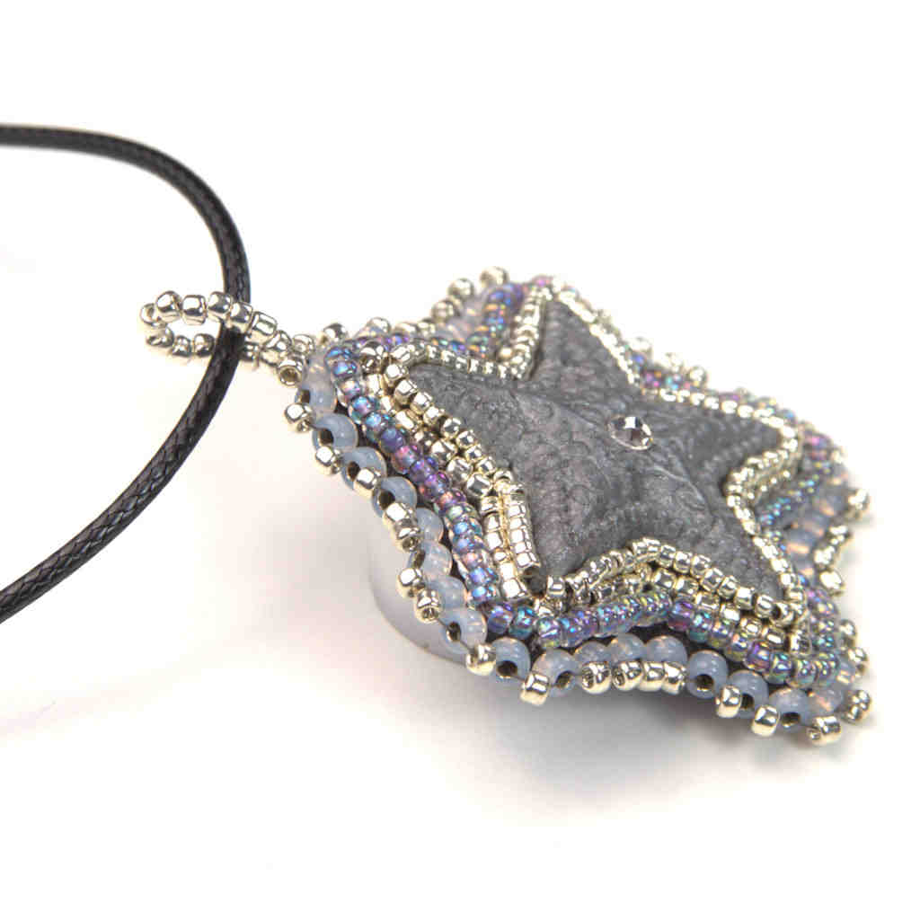 silver star pendant crystal center grey iridescent beaded art