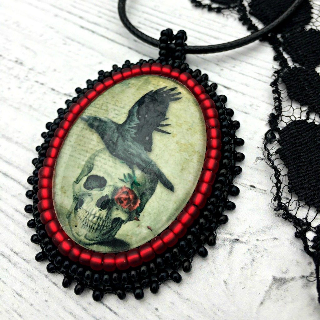 raven and skull pendant