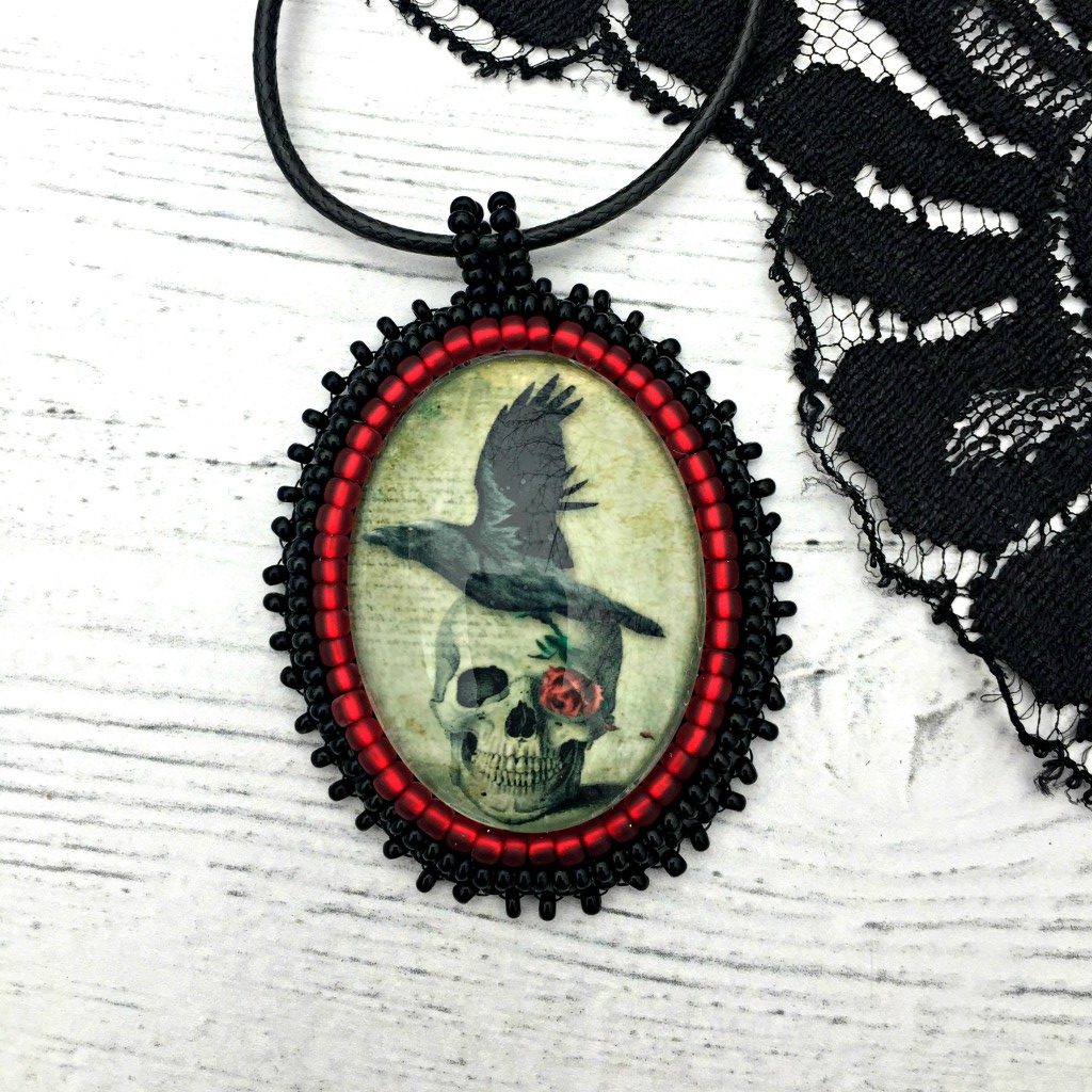 raven and skull pendant