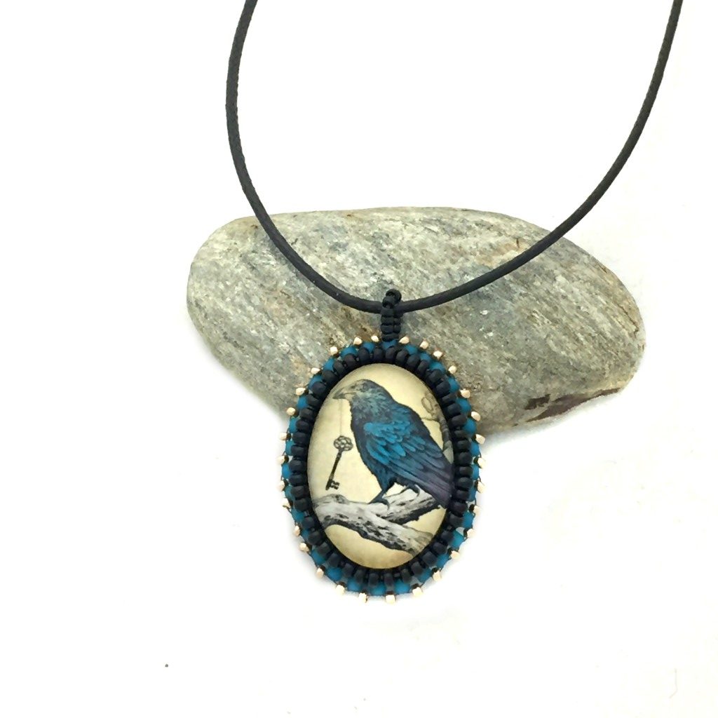 blue raven pendant distance shot