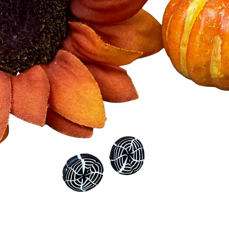 spider web earrings made with polymer clay