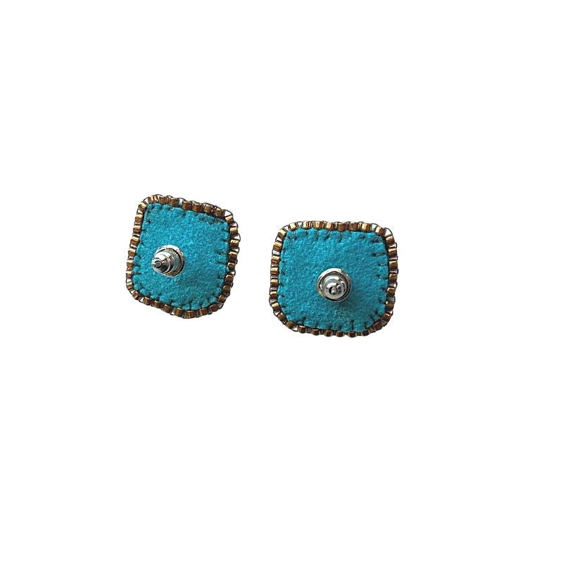 Back view of turquoise square earrings with geometric pattern