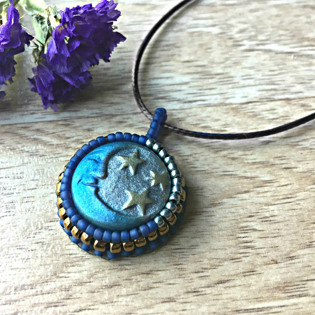 sun and moon necklace flat lay