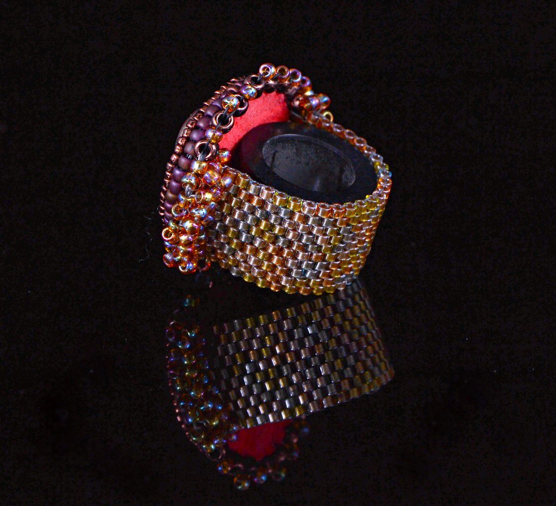 Sun face wide fashion ring with gold, purple and bronze microbeaded band and bezel