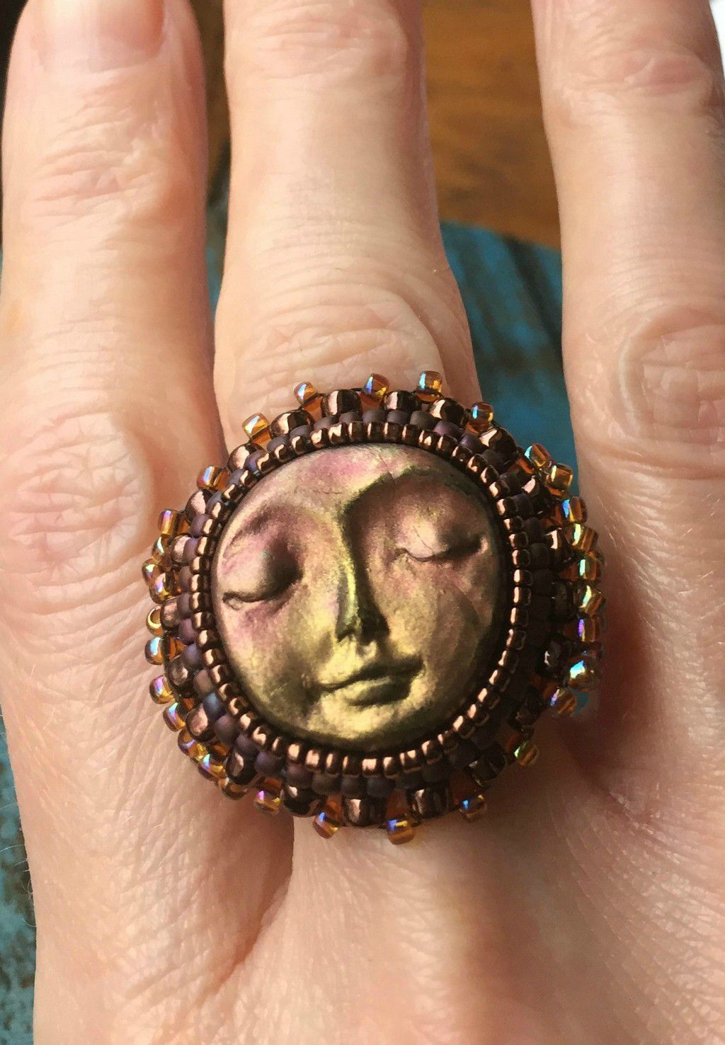 Sun face wide fashion ring with gold, purple and bronze microbeaded band and bezel