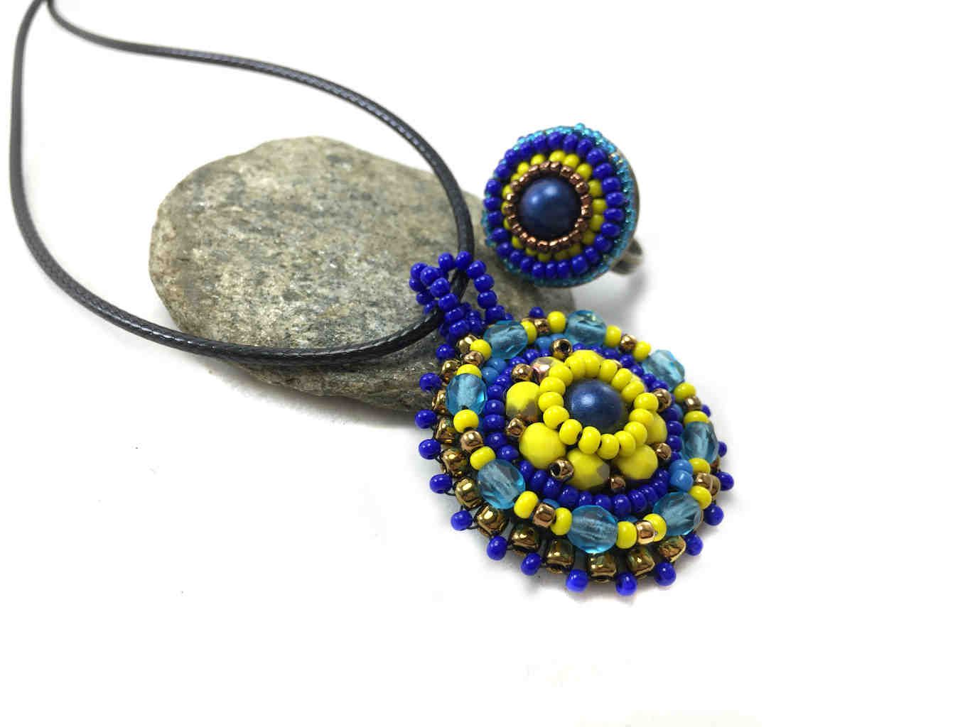 Mandala pendant and ring set in blue and yellow sun saluation 3