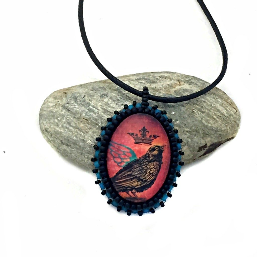 Raven Necklace with teal wing and crown
