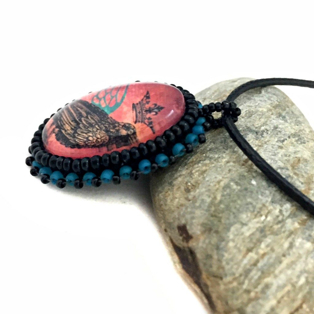 raven oval necklace with beaded edge