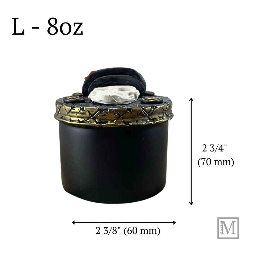 Side view of  skull with top hat decorative tin with measurements for reference.