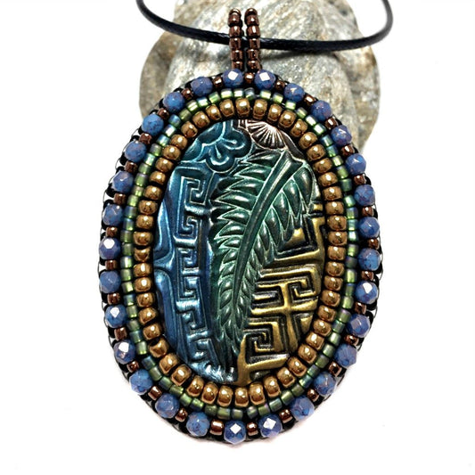 zentangle art pendant with blue crystals